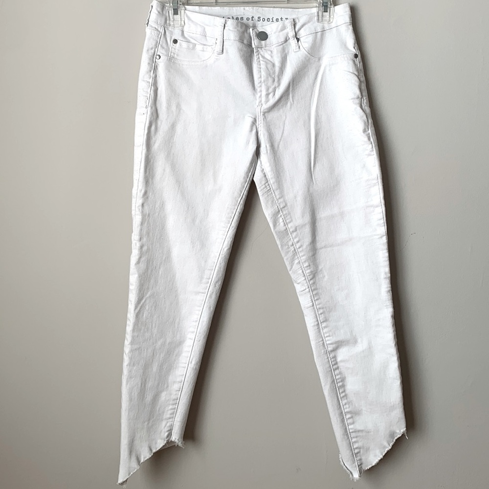 ARTICLES OF SOCIETY | white asymmetrical raw hem skinny jeans